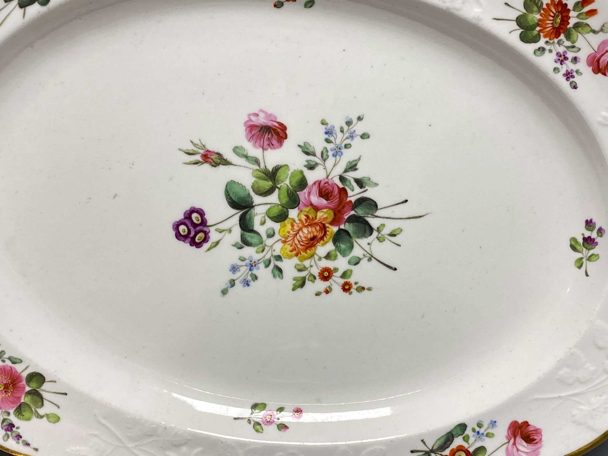 Two Spode 1918 pattern oval dishes painted with floral sprays